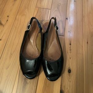 Clark’s orlena currant black patent leather peep toe wedge sandals. Comfy!